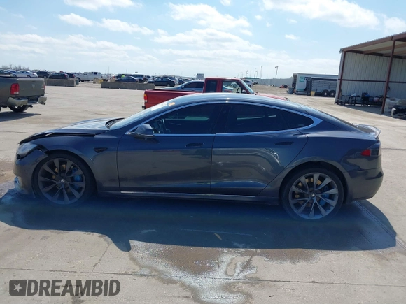 2017 Tesla Model S 100D with VIN 5YJSA1E29HF204881, listed as a IAAI auction lot 41785767 with 146,523 mi miles and . Bid and sale history available at DreamBid. Image 14.