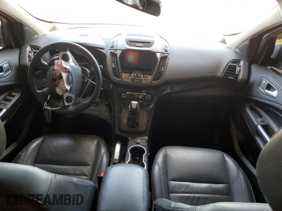 2016 Ford Escape Titanium with VIN 1FMCU9J91GUA11090, listed as a Copart auction lot 54231675 with 135,735 mi miles and Salvage Title. Bid and sale history available at DreamBid. Image 8.