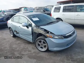 2012 Honda Civic Sdn LX with VIN 2HGFB2F54CH539841, listed as a IAAI auction lot 41797362 with 145,732 mi miles. Bid and sale history available at carsss.com. Image 1.