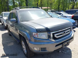 2009 Honda Ridgeline RTS with VIN 5FPYK16409B105186, listed as a IAAI auction lot 42003632 with 153,072 mi miles. Bid and sale history available at carsss.com. Image 1.