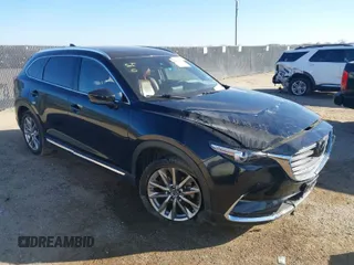 2018 Mazda CX-9 Signature with VIN JM3TCBEY2J0207786, listed as a IAAI auction lot 41478330 with 99,311 mi miles and . Bid and sale history available at carsss.com. Image 1.