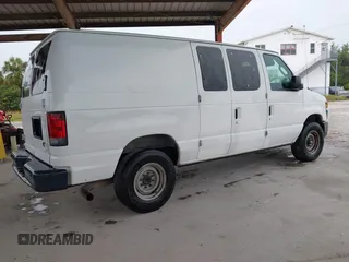 2011 Ford Econoline Cargo Commercial with VIN 1FTNE2EL5BDB35198, listed as a IAAI auction lot 42181448 with 205,128 mi miles and . Bid and sale history available at DreamBid. Image 4.