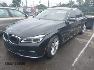 2018 BMW 7 Series 750i z VIN WBA7F0C59JGM23945, wystawiony jako IAAI lot #42236737 z przebiegiem 65 576 mil mil oraz . Historia ofert i sprzedaży dostępna na DreamBid. Obrazek 2.