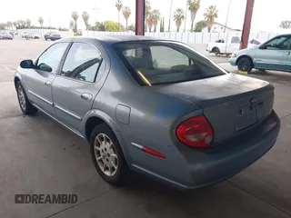 2000 Nissan Maxima GXE z VIN JN1CA31D1YT727156, wystawiony jako IAAI lot #42145772 z przebiegiem 208 427 mil mil oraz . Historia ofert i sprzedaży dostępna na DreamBid. Obrazek 3.