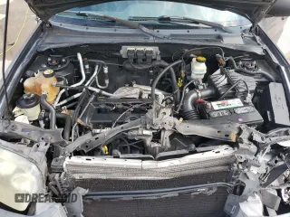 2005 Ford Escape XLS Value with VIN 1FMYU02Z35KA59568, listed as a Copart auction lot 71720604 with 184,007 mi miles and Salvage Title. Bid and sale history available at carsss.com. Image 12.