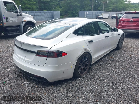 2021 Tesla Model S Plaid z VIN 5YJSA1E62MF452838, wystawiony jako IAAI lot #42726183 z przebiegiem 21 725 mil mil oraz . Historia ofert i sprzedaży dostępna na DreamBid. Obrazek 4.