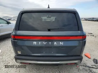 2022 Rivian R1S Launch Edition with VIN 7PDSGABL3NN000739, listed as a Copart auction lot 88127995 with 12,143 mi miles and Salvage Title. Bid and sale history available at DreamBid. Image 6.