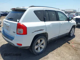 2011 Jeep Compass with VIN 1J4NT1FA3BD139578, listed as a IAAI auction lot 42058499 with 159,322 mi miles. Bid and sale history available at carsss.com. Image 4.