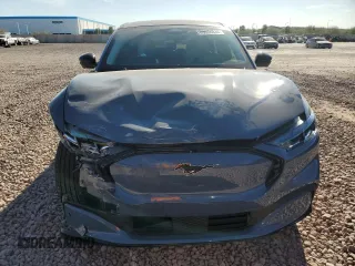 2024 Ford Mustang Mach-E Premium z VIN 3FMTK3R76RMA28805, wystawiony jako Copart lot #85936834 z przebiegiem 1 169 mil mil oraz Szkoda całkowita • Salvage title. Historia ofert i sprzedaży dostępna na DreamBid. Obrazek 5.