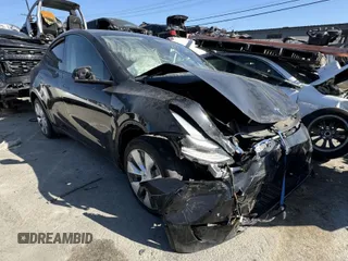 2020 Tesla Model Y Long Range with VIN 5YJYGDEE9LF055157, listed as a IAAI auction lot 42012520 with 45,282 mi miles and . Bid and sale history available at DreamBid. Image 1.