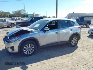 2016 Mazda CX-5 Sport with VIN JM3KE2BE9G0915168, listed as a IAAI auction lot 41482749 with 86,802 mi miles and . Bid and sale history available at carsss.com. Image 14.