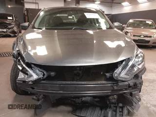 2019 Nissan Sentra S z VIN 3N1AB7AP3KY368736, wystawiony jako IAAI lot #42283123 z przebiegiem 89 117 mil mil oraz . Historia ofert i sprzedaży dostępna na DreamBid. Obrazek 6.