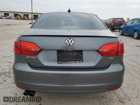 2014 Volkswagen Jetta SE with VIN 3VWD07AJ7EM363186, listed as a Copart auction lot 60873465 with 215,323 mi miles and Salvage title. Bid and sale history available at DreamBid. Image 6.