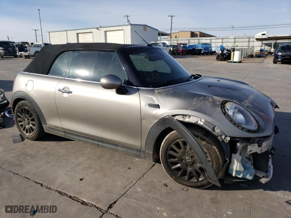 2016 MINI Cooper Convertible with VIN WMWWG5C54G3C19613, listed as a Copart auction lot 83847664 with 99,243 mi miles and Salvage Title. Bid and sale history available at carsss.com. Image 4.