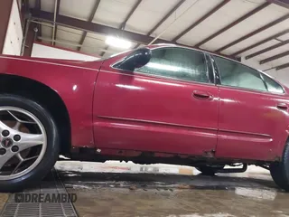 2004 Pontiac Grand Am SE with VIN 1G2NE52F94C247452, listed as a IAAI auction lot 41480289 with 154,690 mi miles. Bid and sale history available at carsss.com. Image 12.
