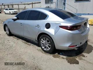 2019 Mazda 3 with VIN 3MZBPABL8KM112754, listed as a Copart auction lot 60616045 with 77,292 mi miles and Clean title. Bid and sale history available at DreamBid. Image 2.