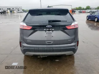 2024 Ford Edge SEL z VIN 2FMPK4J97RBA98092, wystawiony jako Copart lot #52000715 z przebiegiem 23 845 mil mil oraz Szkoda całkowita • Salvage title. Historia ofert i sprzedaży dostępna na DreamBid. Obrazek 6.