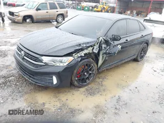 2023 Volkswagen Jetta Sport z VIN 3VWBM7BU2PM028974, wystawiony jako IAAI lot #41547698 z przebiegiem 30 061 mil mil oraz . Historia ofert i sprzedaży dostępna na DreamBid. Obrazek 17.