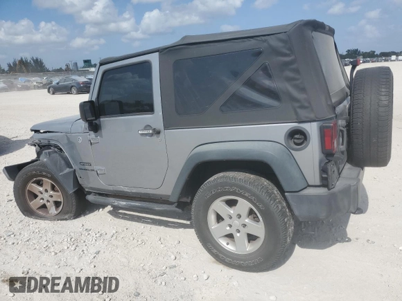 2015 Jeep Wrangler Sport with VIN 1C4AJWAG1FL745444, listed as a Copart auction lot 54062935 with 175,998 mi miles and Salvage Title. Bid and sale history available at carsss.com. Image 2.