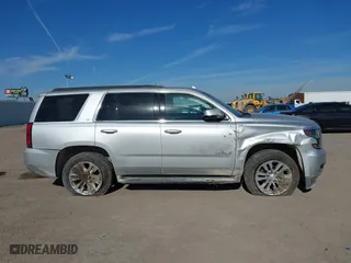 2020 Chevrolet Tahoe LT with VIN 1GNSCBKC5LR226822, listed as a IAAI auction lot 41334853 with 77,091 mi miles. Bid and sale history available at carsss.com. Image 13.