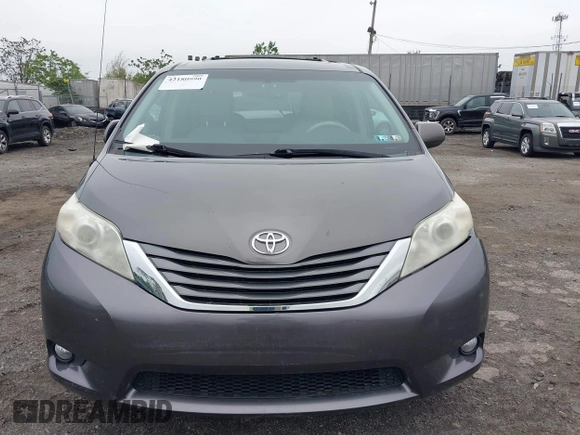 2014 Toyota Sienna XLE with VIN 5TDYK3DC0ES436502, listed as a IAAI auction lot 42180990 with 154,839 mi miles and . Bid and sale history available at DreamBid. Image 13.