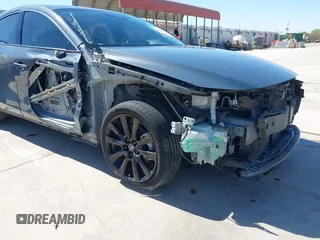 2022 Mazda 3 2.5 Turbo z VIN 3MZBPBAY8NM308426, wystawiony jako IAAI lot #41808563 z przebiegiem 44 693 mil mil oraz . Historia ofert i sprzedaży dostępna na DreamBid. Obrazek 6.