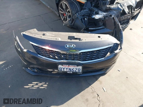 2019 Kia Optima LX z VIN 5XXGT4L38KG319215, wystawiony jako IAAI lot #42226251 z przebiegiem 70 449 mil mil oraz . Historia ofert i sprzedaży dostępna na DreamBid. Obrazek 12.