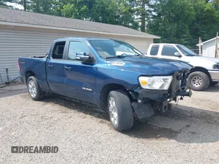 2022 Ram 1500 Big Horn with VIN 1C6SRFBT1NN255976, listed as a IAAI auction lot 42461238 with 56,518 mi miles and . Bid and sale history available at DreamBid. Image 1.