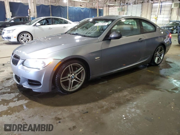 2011 BMW 3 Series 335is with VIN WBAKG1C56BE599457, listed as a Copart auction lot 52412655 with 134,497 mi miles and Clean title. Bid and sale history available at DreamBid. Image 1.
