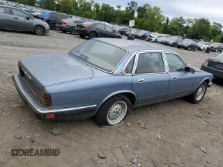 1989 Jaguar XJ with VIN SAJHY1540KC578115, listed as a Copart auction lot 69142274 with Not Provided miles and Clean Title. Bid and sale history available at DreamBid. Image 3.