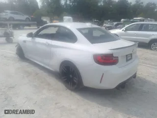 2017 BMW M2 with VIN WBS1H9C31HV888790, listed as a IAAI auction lot 36774031 with 82,821 mi miles. Bid and sale history available at carsss.com. Image 3.