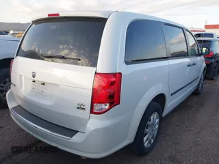 2014 Ram Cargo Van Tradesman with VIN 2C4JRGAGXER428637, listed as a IAAI auction lot 41907425 with 216,588 mi miles. Bid and sale history available at carsss.com. Image 4.