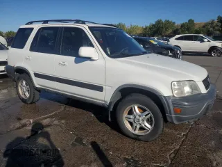 1999 Honda CR-V EX with VIN JHLRD1769XC073360, listed as a Copart auction lot 73049194 with 155,527 mi miles and Salvage Title. Bid and sale history available at carsss.com. Image 4.