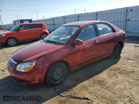 2009 Kia Spectra EX with VIN KNAFE221395656476, listed as a Copart auction lot 77700844 with 90,079 mi miles and Salvage Title. Bid and sale history available at carsss.com. Image 1.