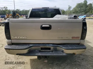 2003 GMC Sierra Denali z VIN 2GTFK69U831201215, wystawiony jako Copart lot #73801184 z przebiegiem 186 959 mil mil oraz Szkody całkowita. Historia ofert i sprzedaży dostępna na DreamBid. Obrazek 6.