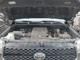 2019 Toyota Tundra SR with VIN 5TFRM5F1XKX143105, listed as a IAAI auction lot 41274567 with 180,602 mi miles and . Bid and sale history available at DreamBid. Image 10.