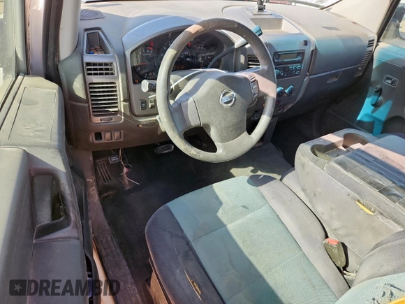 2007 Nissan Titan LE with VIN 1N6BA06AX7N242455, listed as a Copart auction lot 61811175 with 211,040 mi miles and Salvage title. Bid and sale history available at DreamBid. Image 8.