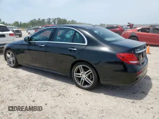 2017 Mercedes-Benz E 300 Luxury with VIN WDDZF4JB8HA123652, listed as a Copart auction lot 57050205 with 105,048 mi miles and Salvage title. Bid and sale history available at DreamBid. Image 2.