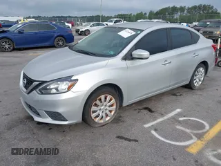 2018 Nissan Sentra SV with VIN 3N1AB7AP2JY313399, listed as a IAAI auction lot 42128878 with 123,577 mi miles. Bid and sale history available at carsss.com. Image 2.