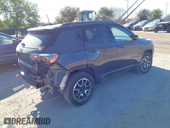 2024 Jeep Compass Trailhawk with VIN 3C4NJDDN4RT135384, listed as a IAAI auction lot 41251948 with 6,981 mi miles and . Bid and sale history available at DreamBid. Image 4.