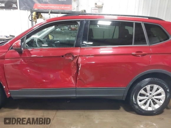 2018 Volkswagen Tiguan S with VIN 3VV0B7AX5JM104191, listed as a IAAI auction lot 42492503 with 96,339 mi miles and . Bid and sale history available at DreamBid. Image 14.