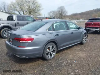2021 Volkswagen Passat 2.0T SE with VIN 1VWSA7A3XMC011113, listed as a IAAI auction lot 41942881 with 63,753 mi miles. Bid and sale history available at carsss.com. Image 4.