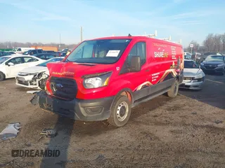 2020 Ford Transit Cargo z VIN 1FTBR1Y83LKB49056, wystawiony jako IAAI lot #41168050 z przebiegiem 91 855 mil mil oraz . Historia ofert i sprzedaży dostępna na DreamBid. Obrazek 17.