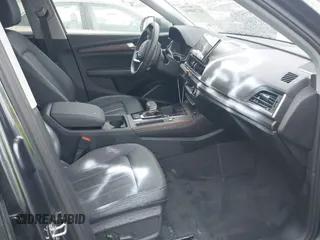 2023 Audi Q5 S line Premium Plus z VIN WA1EAAFY7P2178566, wystawiony jako IAAI lot #41734994 z przebiegiem Nie podano mil oraz . Historia ofert i sprzedaży dostępna na DreamBid. Obrazek 5.