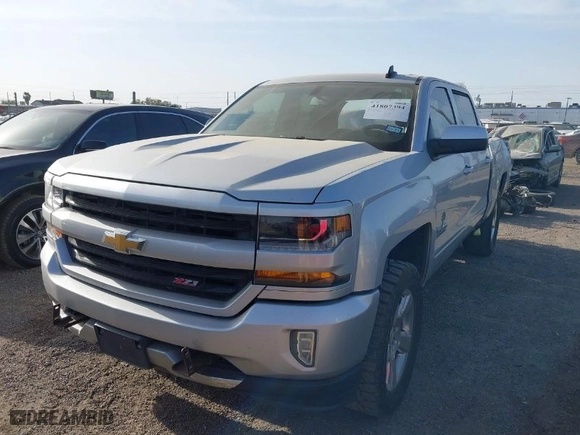 2017 Chevrolet Silverado 1500 LT with VIN 3GCUKREC2HG392487, listed as a IAAI auction lot 41807394 with 113,041 mi miles. Bid and sale history available at carsss.com. Image 2.
