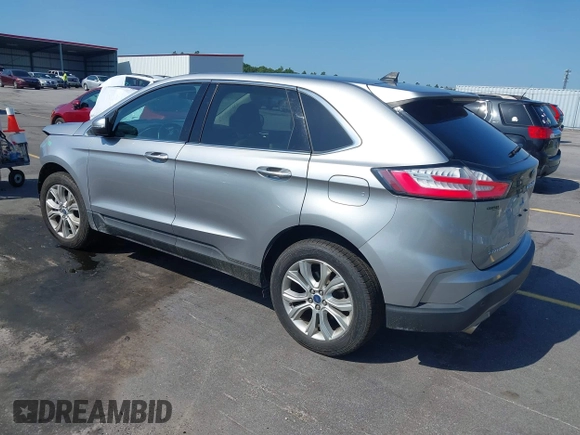 2021 Ford Edge Titanium with VIN 2FMPK3K97MBA15391, listed as a IAAI auction lot 42711656 with 40,723 mi miles and . Bid and sale history available at DreamBid. Image 3.