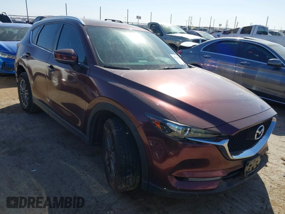 2019 Mazda CX-5 Sport with VIN JM3KFABM2K0686372, listed as a IAAI auction lot 41770183 with 57,202 mi miles and . Bid and sale history available at DreamBid. Image 1.