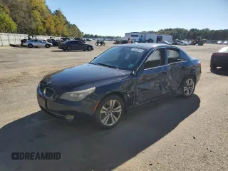 2010 BMW 5 Series 528i xDrive with VIN WBANV1C57AC157302, listed as a Copart auction lot 82043974 with 154,444 mi miles and Salvage Title. Bid and sale history available at carsss.com. Image 1.