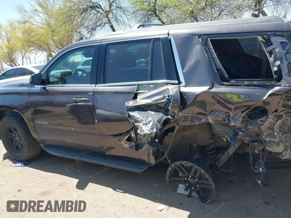 2017 Chevrolet Tahoe LS with VIN 1GNSCAKC3HR328833, listed as a IAAI auction lot 41993364 with 124,817 mi miles and . Bid and sale history available at DreamBid. Image 14.