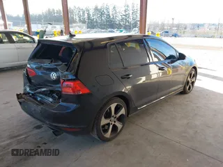 2015 Volkswagen Golf GTI Autobahn w/Performance Pkg with VIN 3VW447AU3FM100063, listed as a IAAI auction lot 41402553 with 70,797 mi miles. Bid and sale history available at carsss.com. Image 4.